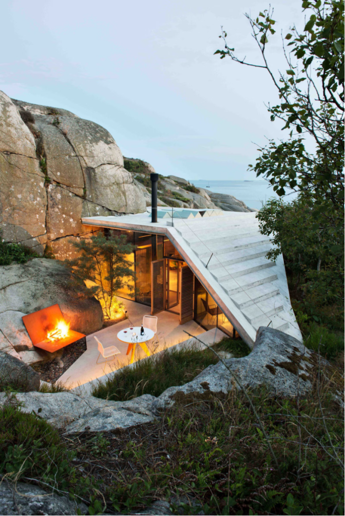 A magical compact cliffside retreat designed by Lundhagem Architects called Knapphullet – Sandefjord, Norway, suspended between land and sea