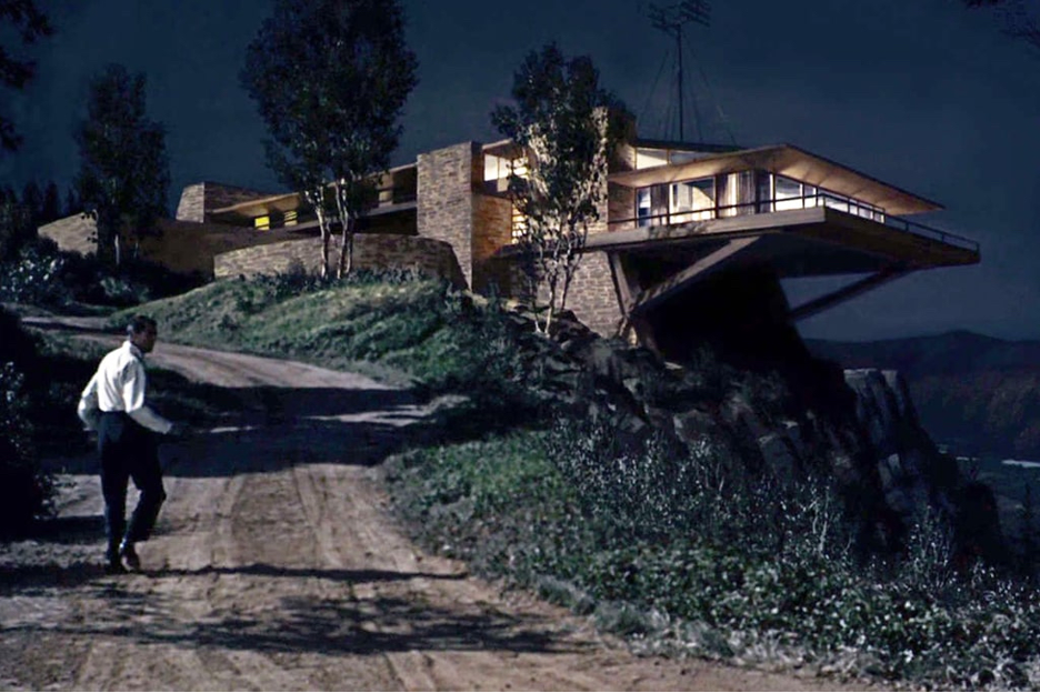 Iconic rendering of the fictional Mt. Rushmore Vandamm House created for Alfred Hitchcock’s classic thriller North by Northwest, courtesy of MGM set director Robert Boyle, via ADA Interiors