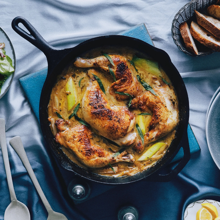 Creamy Cider-Braised Chicken and Leeks in cast-iron skillet
